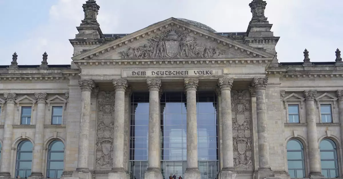 Front view of the historic Reichstag building in Berlin, Germany, featuring classical architecture.