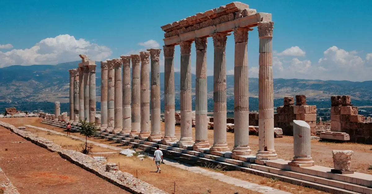 Explore the ancient ruins of Laodicea with iconic columns under a sunny sky in Pamukkale, Türkiye.