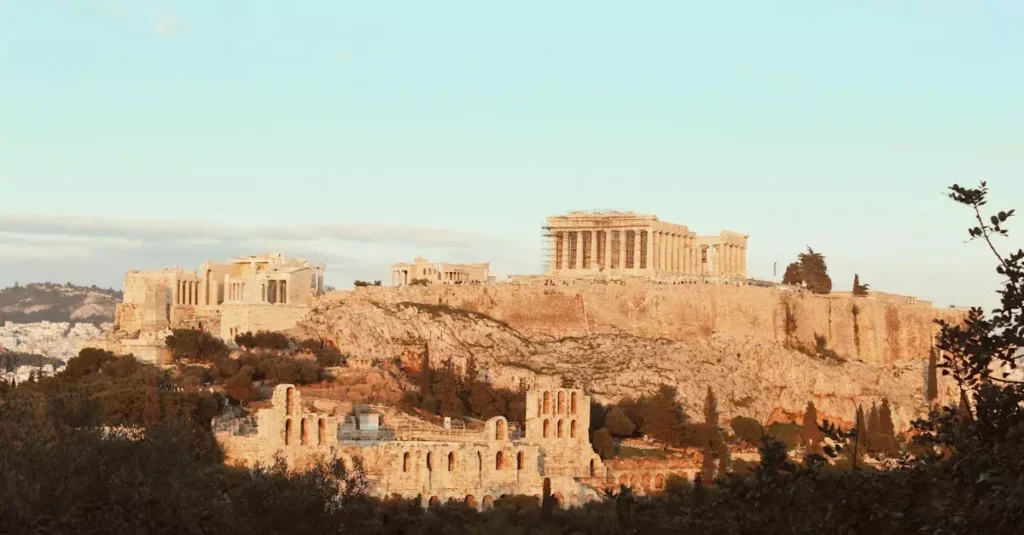 Greece's Best Historical Places: A Traveler's Guide 2 The iconic Acropolis of Athens, a UNESCO World Heritage Site, bathed in warm sunset light.