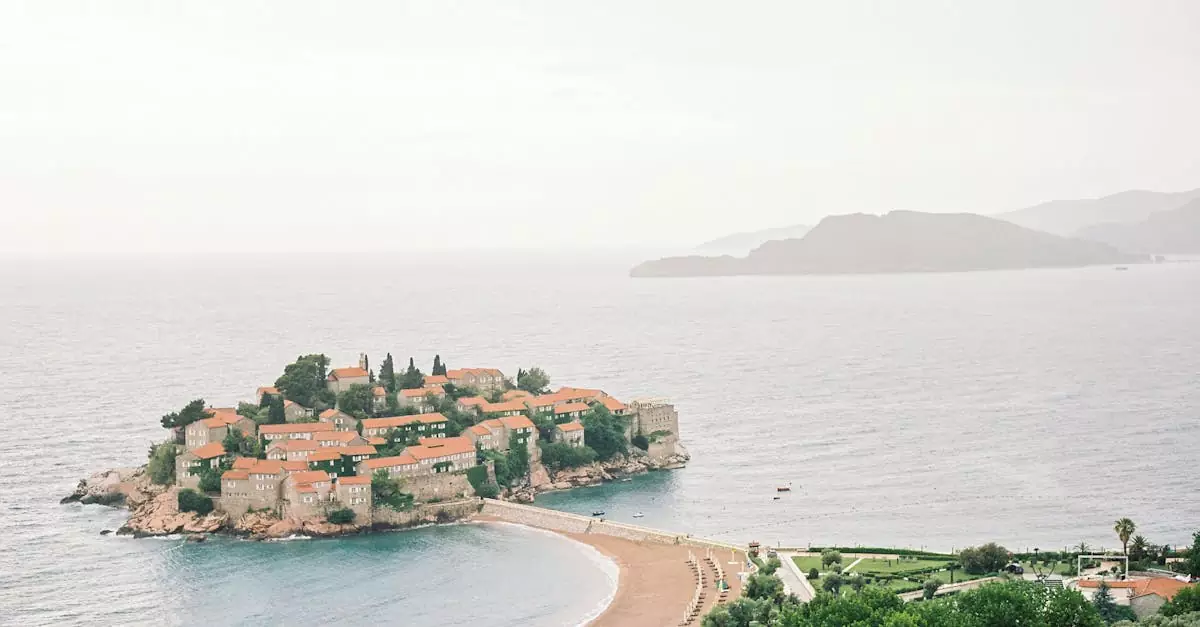 Captivating aerial view of the iconic Sveti Stefan island resort in Montenegro, surrounded by the Adriatic Sea.