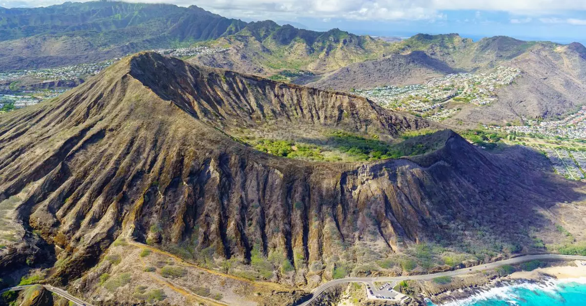Stunning aerial view of Diamond Head volcanic crater overlooking the ocean in Hawaii.