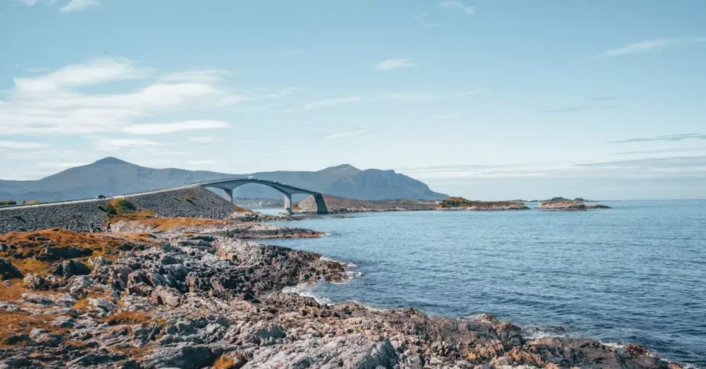 Best Island Road Trips Europe: Your Ultimate Guide 2 Picturesque coastline featuring a unique bridge across rocky terrain and Atlantic waters.