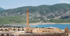 Beautiful view of the historic mosque minaret and surrounding landscape in Hasankeyf, Turkey.