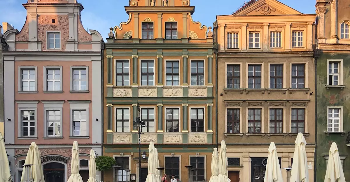 Colorful historic buildings in Old Market Square, Poznań, Poland captured during a sunny day.