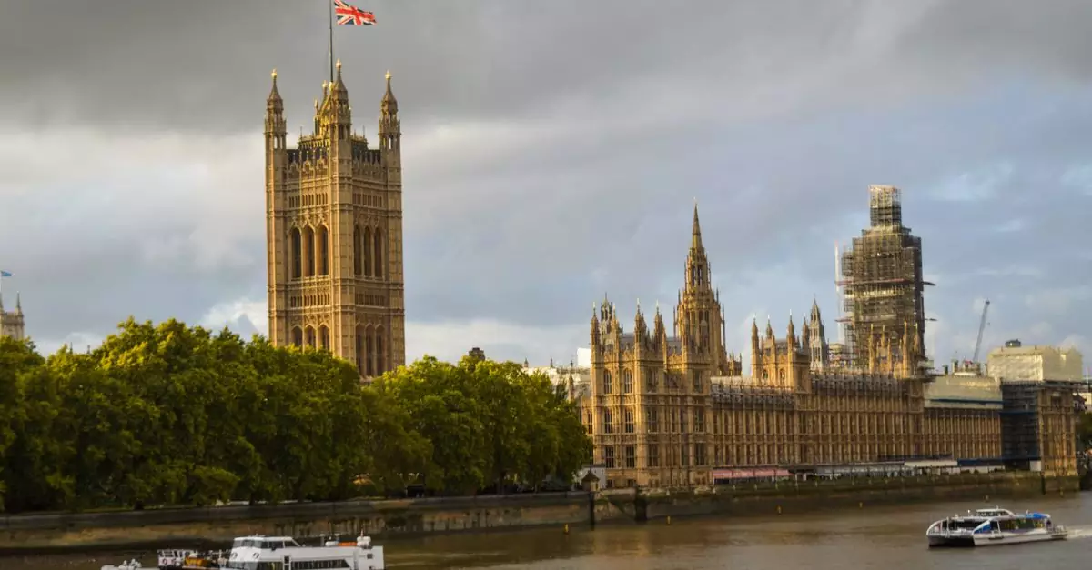 Exterior of the Houses of Parliament near river with steamboats on cloudy foggy day