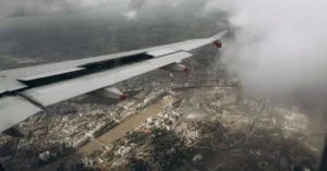 Stunning aerial view of London, capturing iconic landmarks from an airplane window.