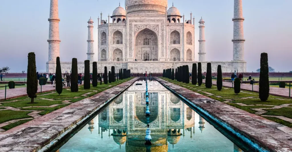Best Luxury Pools World: Opulent Oases Revealed 2 Stunning reflection of the Taj Mahal in Agra, India captured at sunrise.