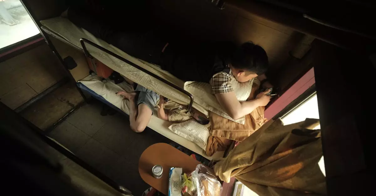Top view of a train compartment with a passenger relaxing, capturing the essence of travel.