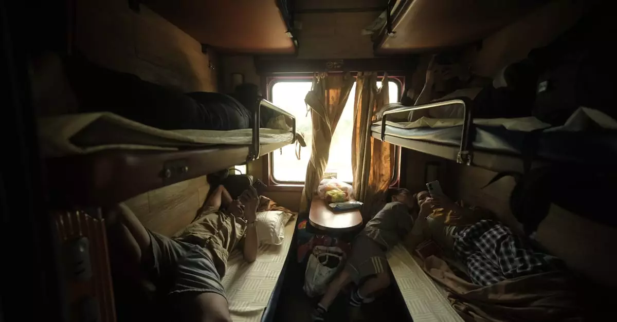 Passengers resting in a cozy train cabin with bunk beds and a window view.