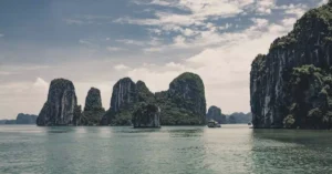 Explore the breathtaking limestone formations of Ha Long Bay, a UNESCO World Heritage site in Vietnam.