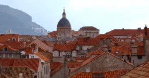 Explore the historic red rooftops of Dubrovnik's Old Town, featuring iconic architecture.