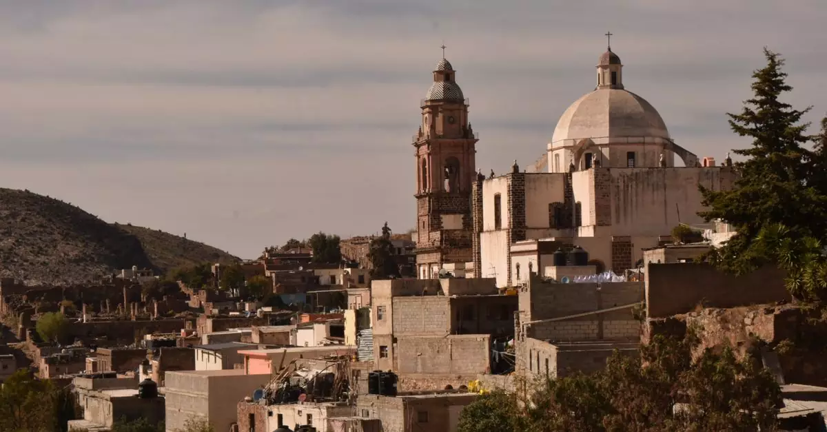 Panoramic townscape featuring historic church in Real de Catorce, S.L.P., México.
