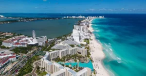 Stunning aerial view of Cancun's beachfront resorts along the vibrant turquoise waters.
