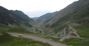 Breathtaking scenic view of the Transfagarasan Highway weaving through the Carpathian Mountains.