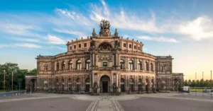 The historic Semper Opera House in Dresden, Germany, bathed in morning light.