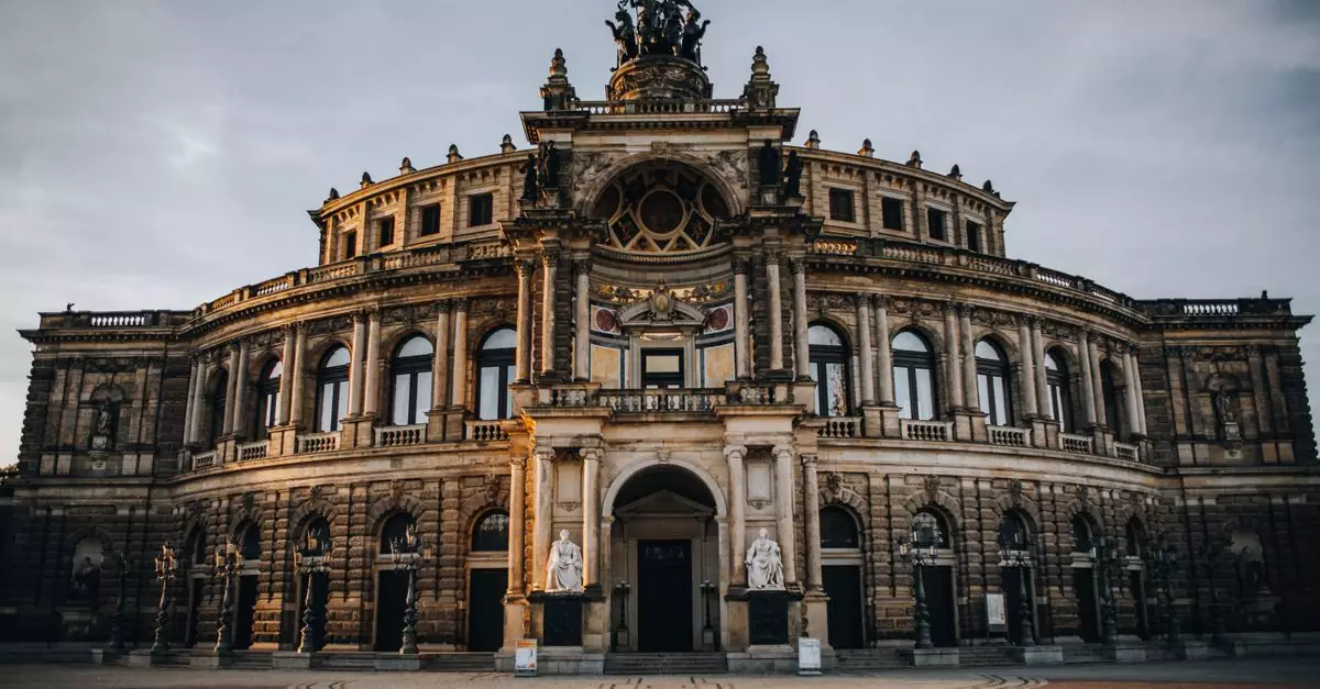 Elegant facade of the Semperoper in Dresden captured at twilight, showcasing its grandeur and architectural beauty.