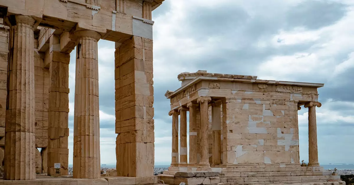 View of ancient Greek temple ruins in Athens, Greece with a cloudy sky, showcasing classical architecture.