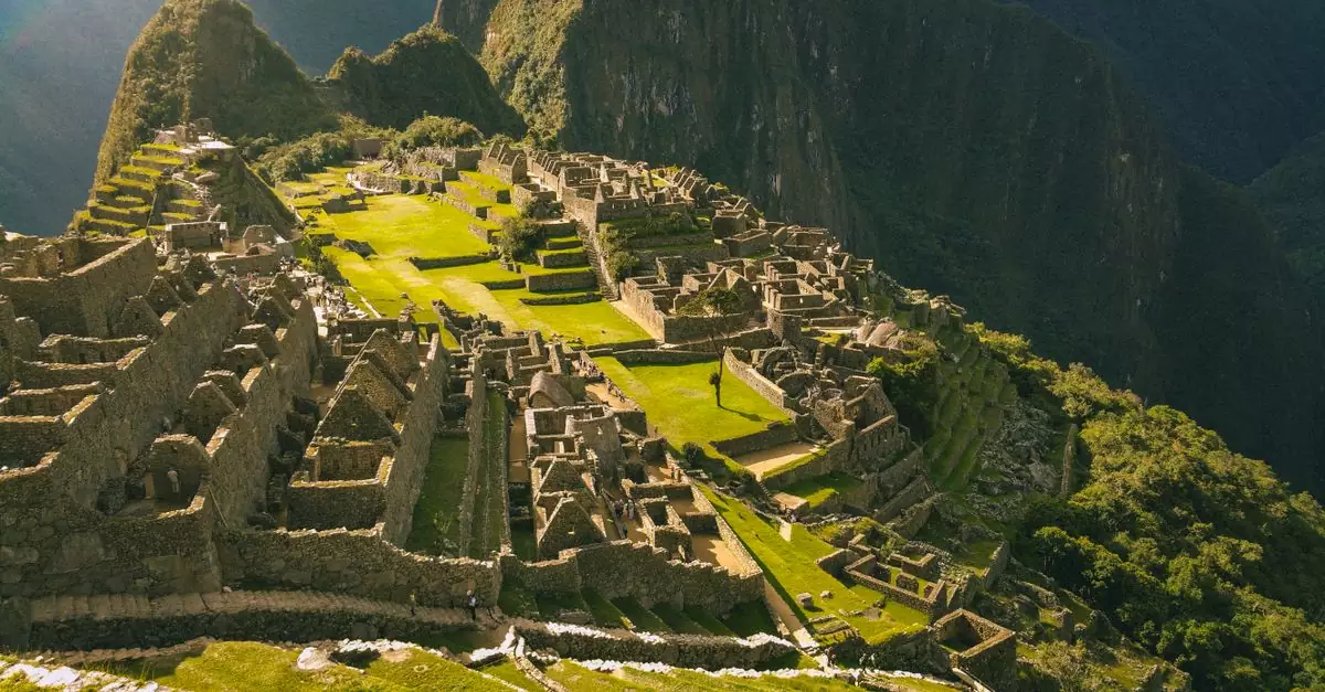 Explore the breathtaking ancient Inca city of Machu Picchu in Peru, a UNESCO World Heritage site.