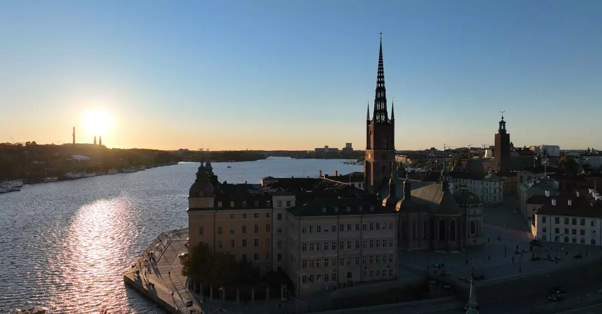 Aerial view of Riddarholmen in Stockholm at sunset, showcasing architectural beauty along the water.