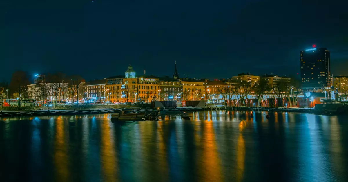 Captivating night view of Jönköping's waterfront, showcasing illuminated buildings and calm reflections.