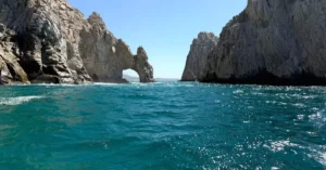 Stunning view of El Arco rock formation in Cabo San Lucas with vibrant blue sea.
