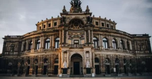 Elegant facade of the Semperoper in Dresden captured at twilight, showcasing its grandeur and architectural beauty.