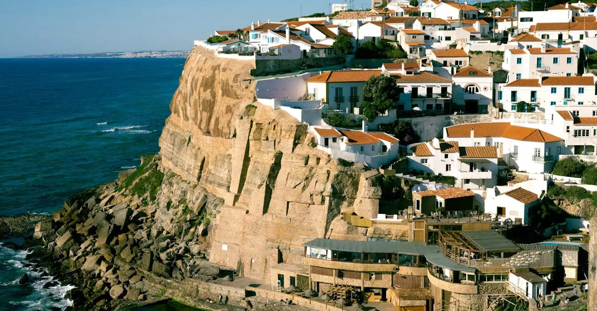 Explore the stunning landscape of Sintra, Portugal with this breathtaking aerial view of its cliffside town.