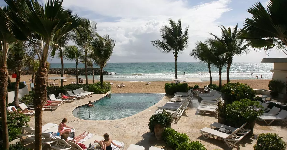 Relax and unwind at a beautiful beachfront resort in San Juan, Puerto Rico, perfect for a tropical vacation.