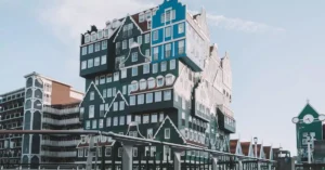 Explore the iconic Inntel Hotel Zaandam with its stunning stacked house design in the Netherlands.