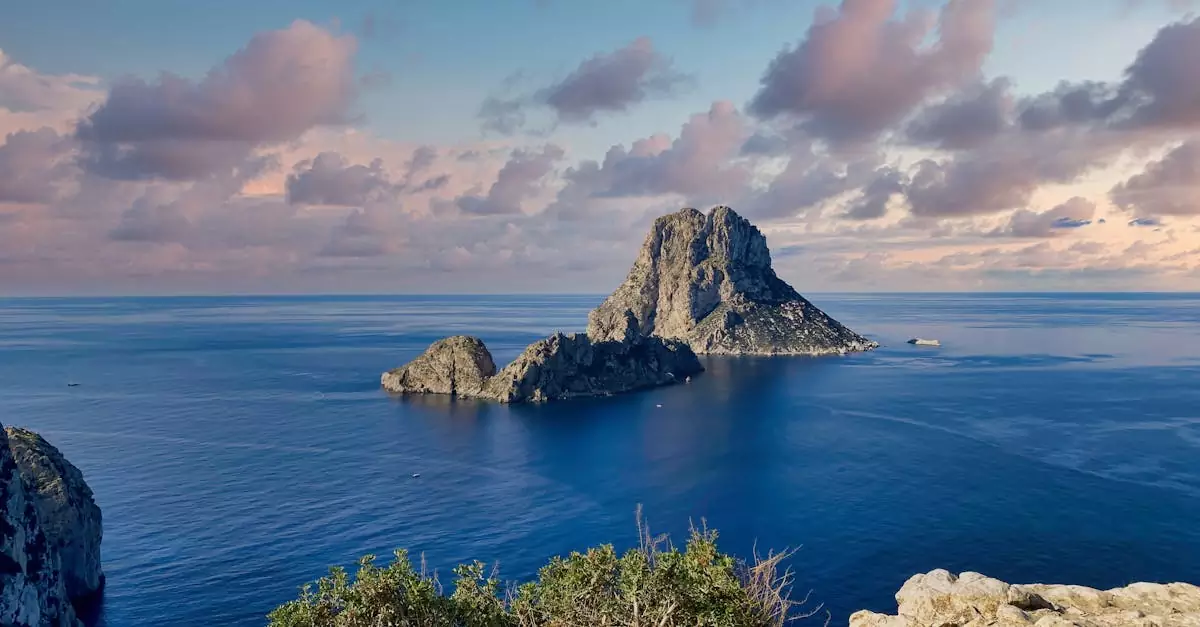 Captivating seascape of Es Vedr&agrave; island at sunset, captured from Es Cubells, Spain.