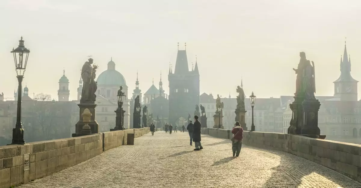 A tranquil morning on Charles Bridge, Prague, showcasing historical architecture under the soft morning light.