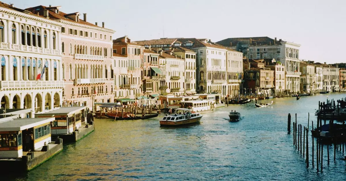 Picturesque view of Venice's Grand Canal with historic buildings and boats.