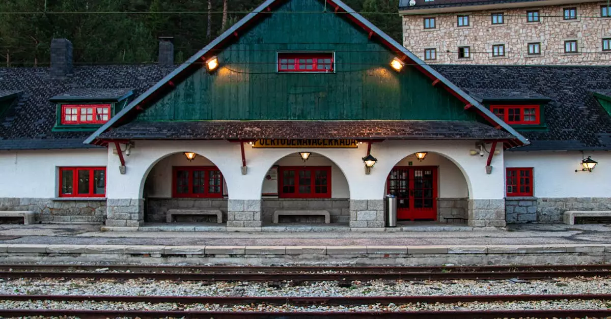 Charming historic train station architecture in Cercedilla, Spain, featuring traditional design and railway tracks.