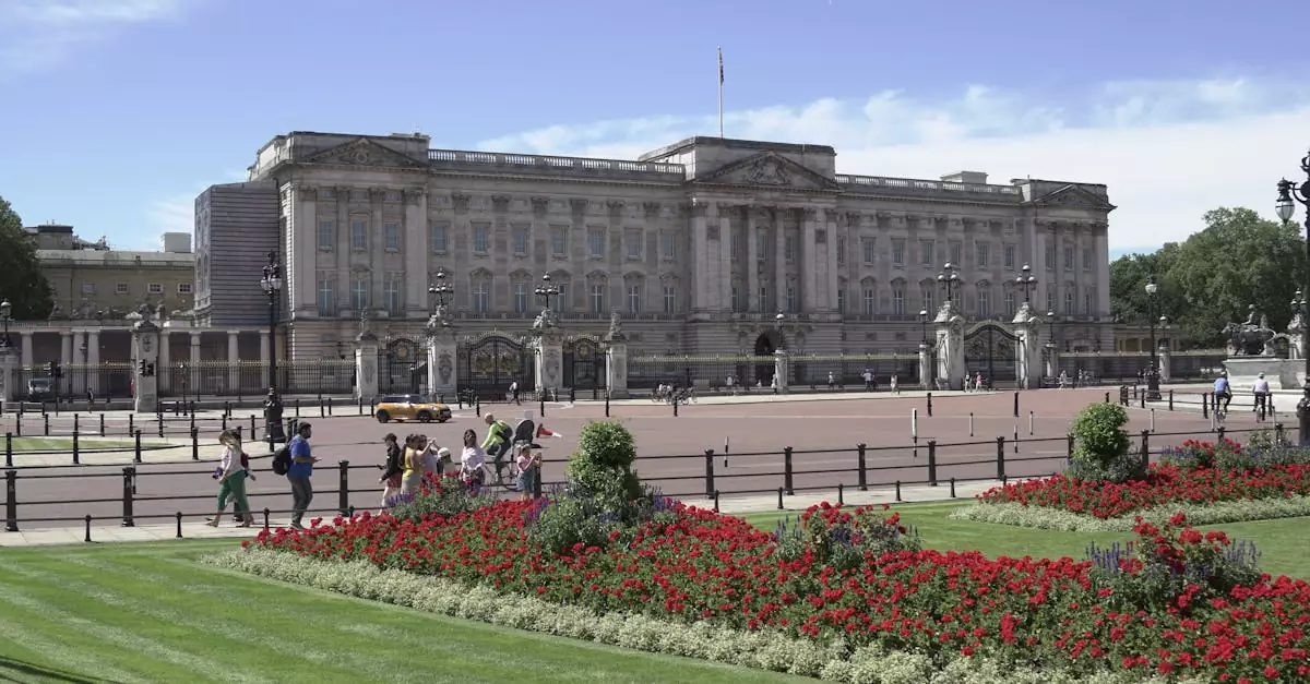 View of Buckingham Palace with lush gardens on a sunny day in London.