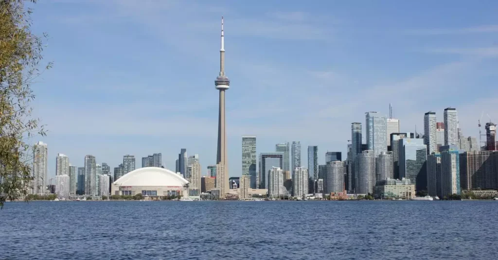 Best Seafood Canada: A Culinary Coast-to-Coast Guide 2 A stunning view of Toronto's skyline with the CN Tower on a sunny day.