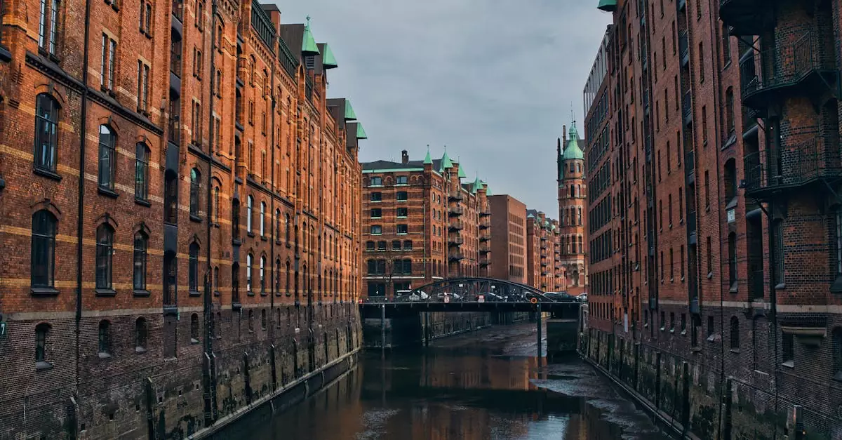 Explore the iconic brick buildings and serene canal of Hamburg's Speicherstadt, a UNESCO heritage site.