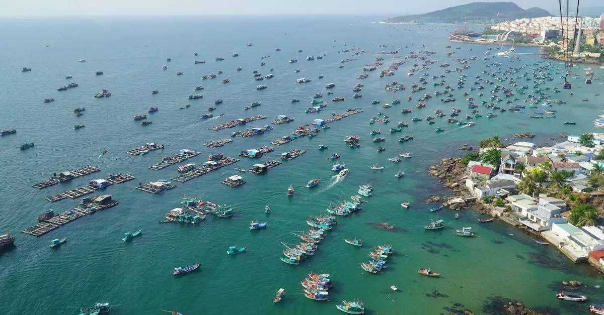Aerial view of numerous fishing boats in Phu Quoc, Vietnam, highlighting vibrant maritime activity.