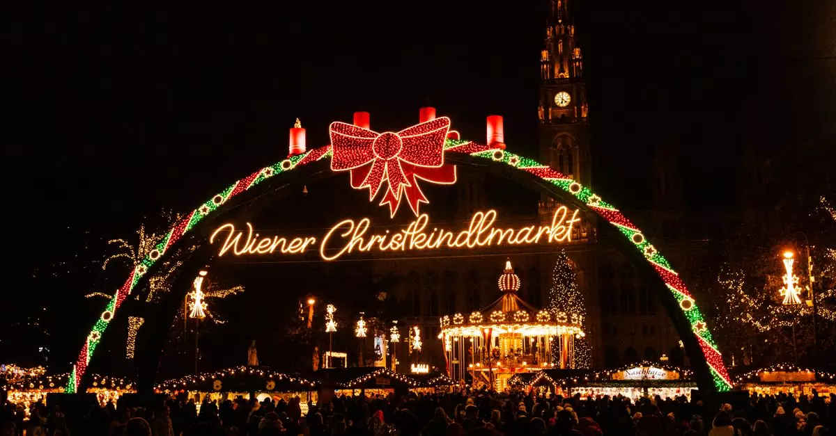 Festive atmosphere at Vienna's Christkindlmarkt with lights in winter.
