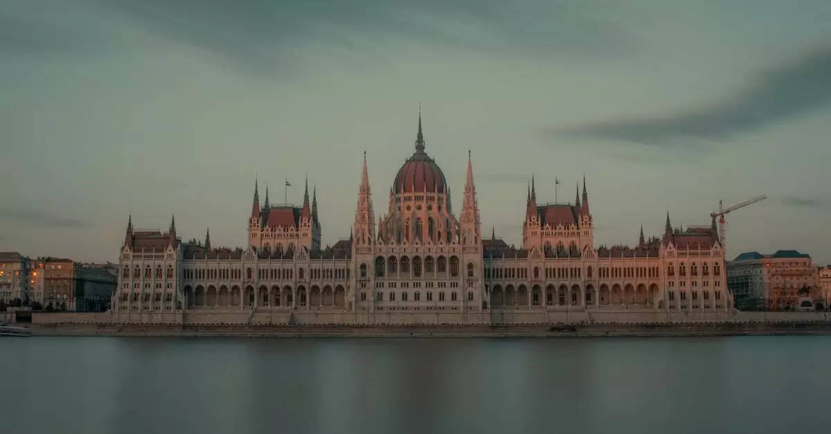 View of the Hungarian Parliament Building in Budapest beautifully lit during twilight.