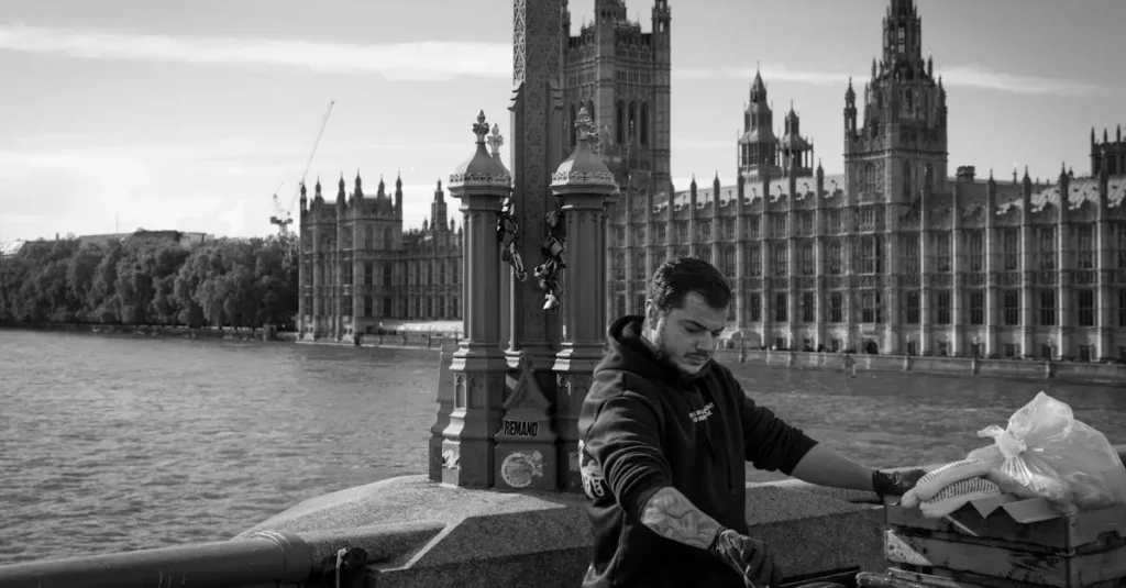 A street vendor prepares food on Westminster Bridge with the Houses of Parliament in the background.