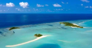 Aerial view of serene tropical islands with azure waters in the Maldives.