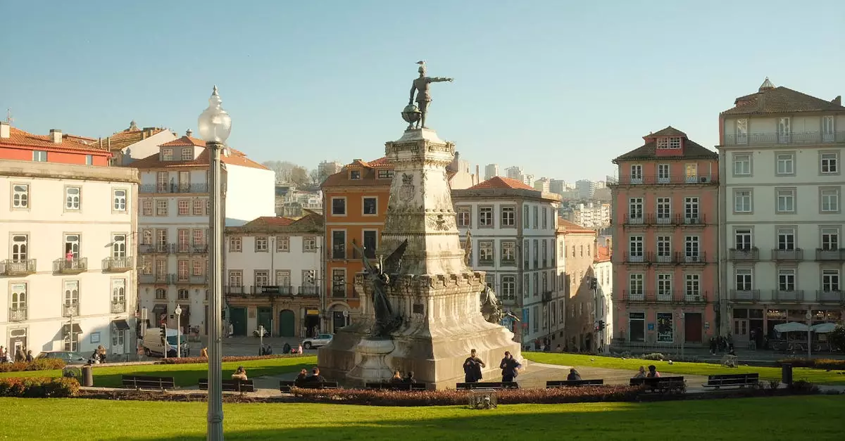 Beautiful view of a statue in Porto's historic square with traditional architecture.