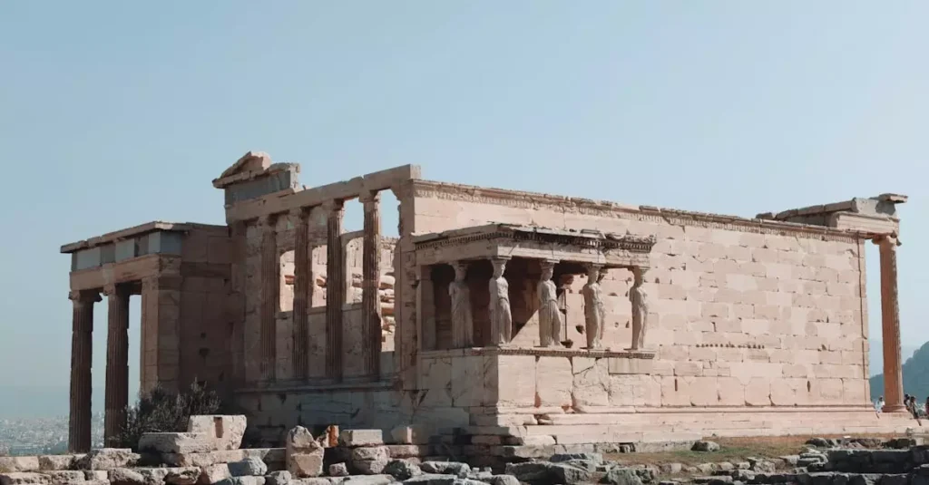 Best UNESCO Sites in Greece: A Traveler's Guide 2 Erechtheion Temple on the Acropolis in Athens, Greece, showcasing ancient Greek architecture.