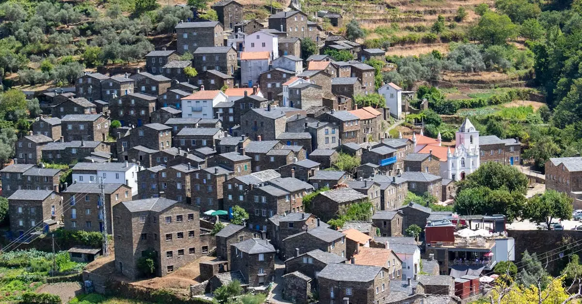 Charming aerial view of Piódão, a historic village nestled in Portugal's Coimbra District.