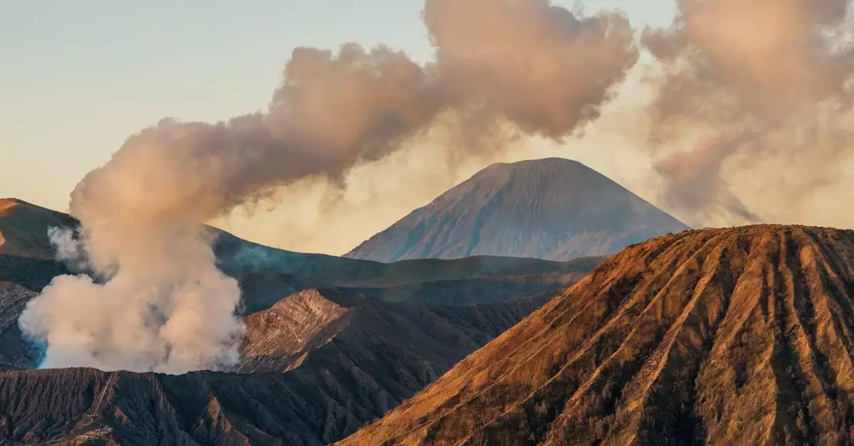 Stunning sunrise view of Mount Bromo smoking in East Java, Indonesia.