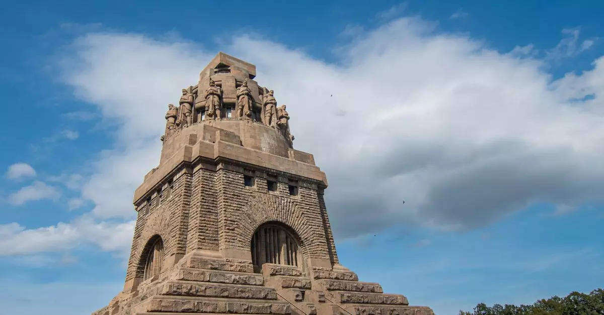 The iconic Völkerschlachtdenkmal in Leipzig, captured on a clear day, showcasing its monumental architecture.