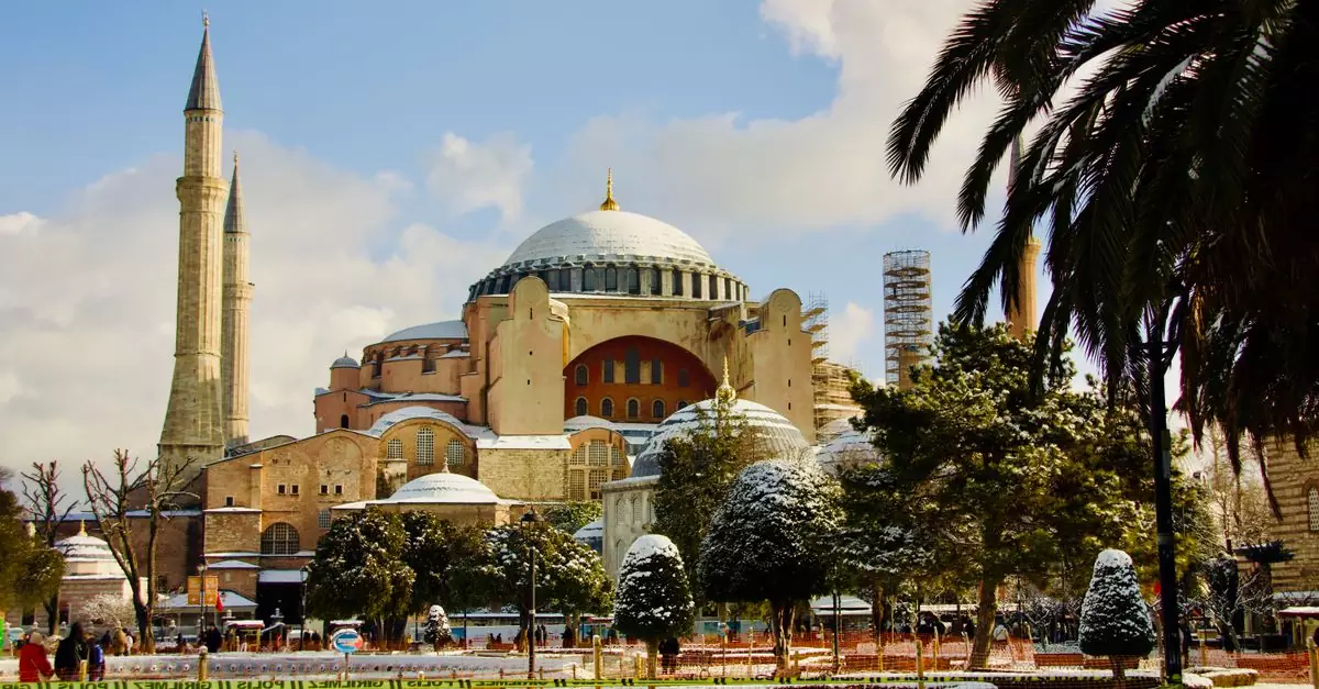 Stunning winter view of the iconic Hagia Sophia in Istanbul with snow-dusted surroundings.