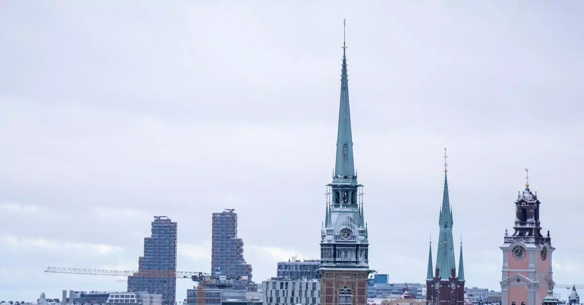 A winter view of Stockholm's iconic spires against a snowy cityscape, showcasing Scandinavian architecture.