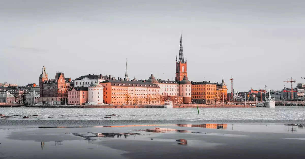 Beautiful view of Stockholm's skyline reflecting on icy waters at dusk.