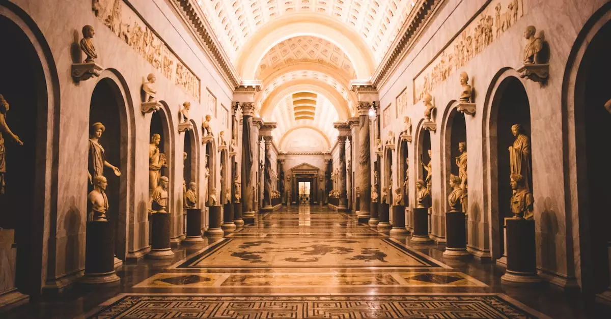 A stunning view of a hallway adorned with classical sculptures in the Vatican Museums.